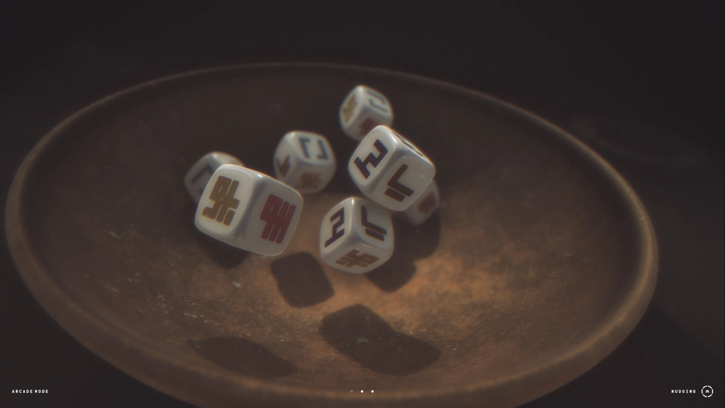 White kana dice tumbling inside the bowl, viewed from above.