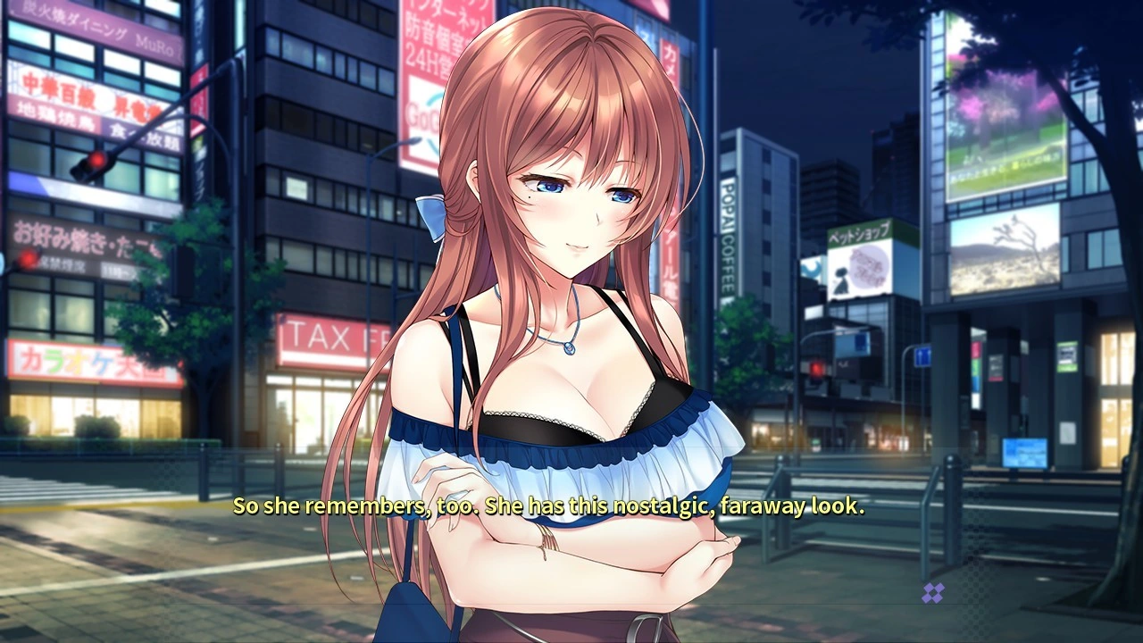 Chihiro stands in a blue top on a lit city street at night.